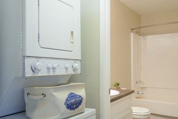 a laundry room with a washer and dryer